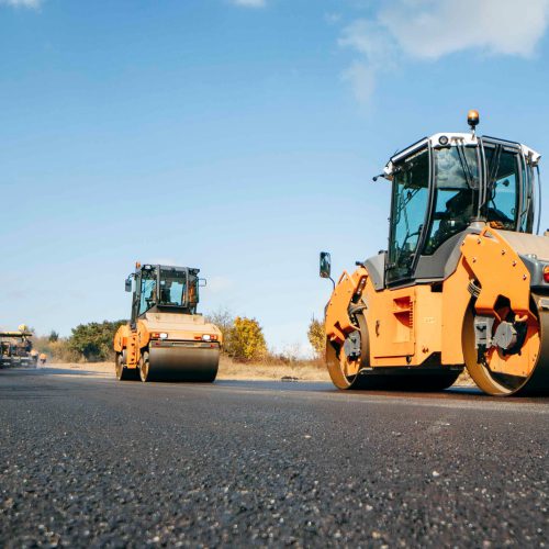 Asphalt rollers laying road