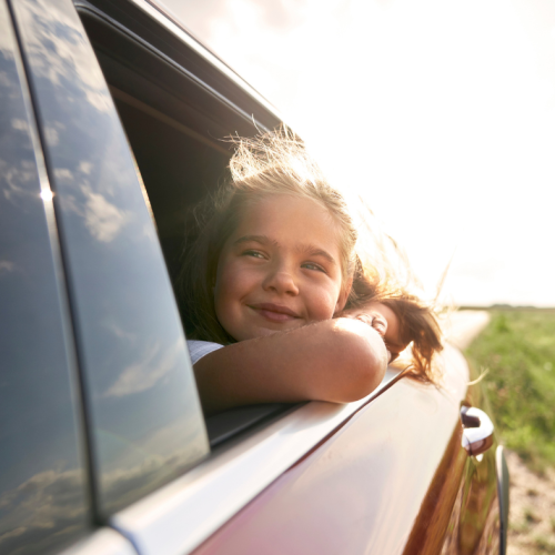Child looking out of car window