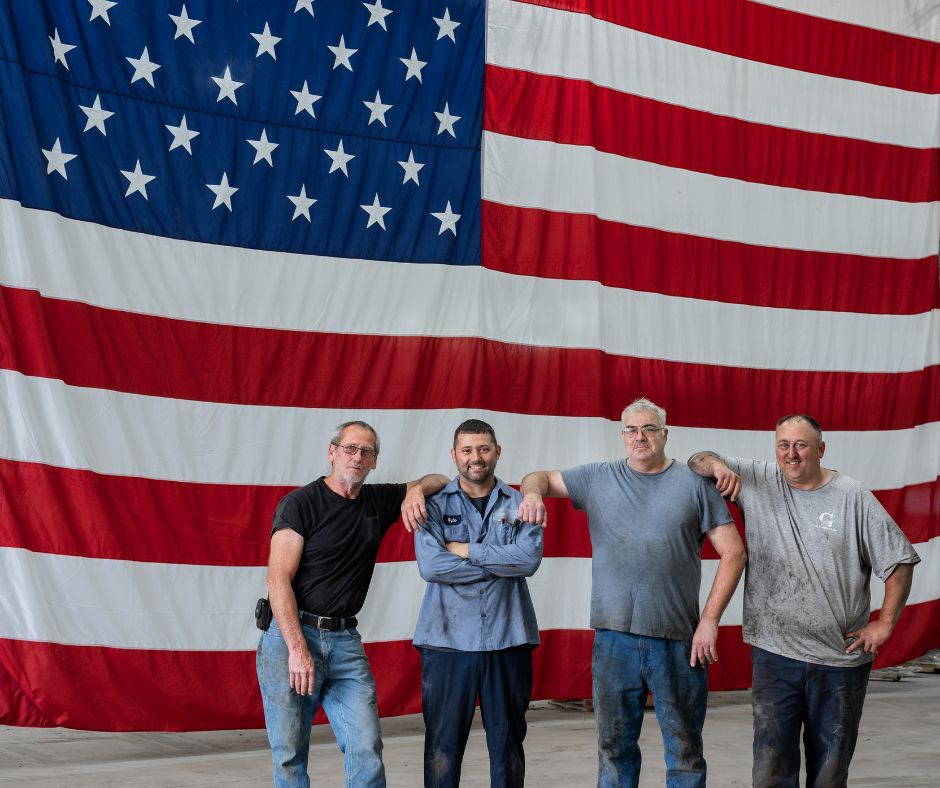 Gerken workers in front of large US flag