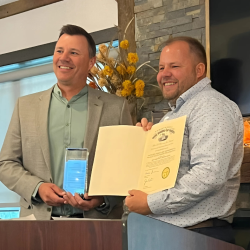 Gerken and Kyle Borstelman share in recognition.